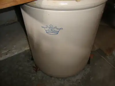 You won't be carrying this crock around much. It weighs a lot. These old crocks were used for preser...