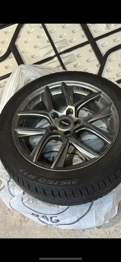 17” Alloy Wheels by FAST Rims Plus Pirelli winter tires 215 50 17 with lots of tread. Complete SET O...