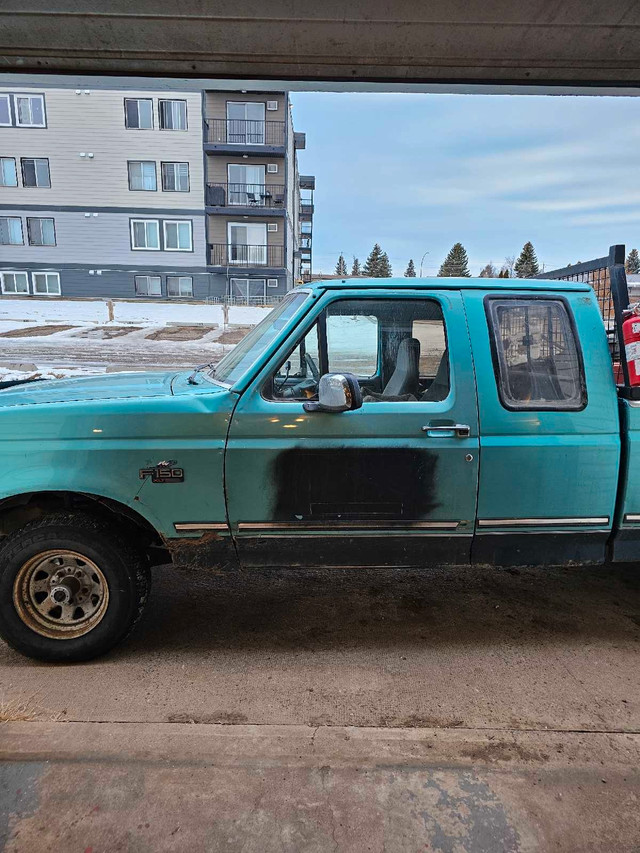 1995 extended cab F150 xlt 4x4 302 or (5.0) in Cars & Trucks in Medicine Hat