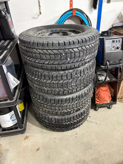 Set of used 275/65r18 Firestone winterforce load range E tires, rims, and sensors for sale. Rims and...