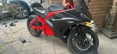 Electric Kawasaki Ninja model. Runs very fast, goes upto 100km/h Mileage around 50-60 km on full cha...