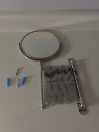 Retractable wall mount mirror 