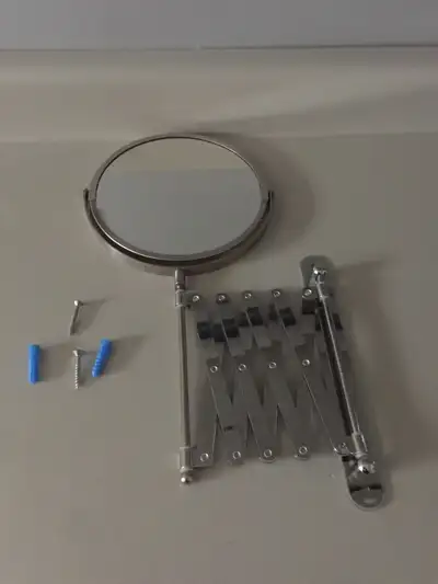 Retractable wall mount mirror 7 inches comes with hardware pickup elmwood area