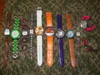 COLLECTION OF 11 WATCHES