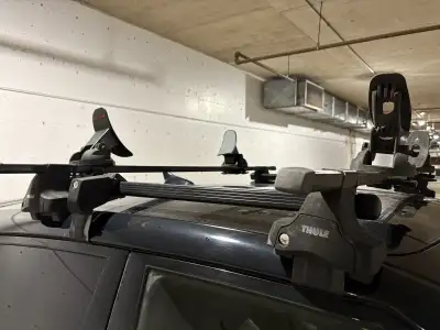 Get ready for your next kayaking adventure with this Thule car rack system, complete with kayak crad...