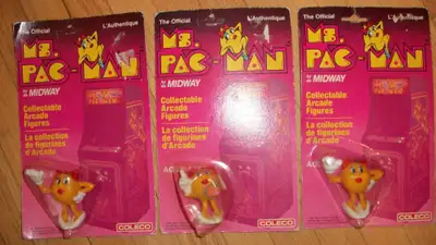 **All new in original pkgs. **3 Pac Man 80's, 3in. H, 2 Ms.,1 Mrs., $25.ea. ** 4 Garfield Wisecracks...