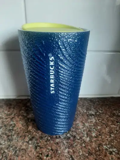 Blue Starbucks coffee mug. Never been used.