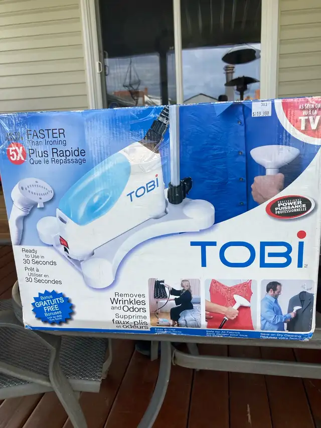 steamer for drapes, clothes ect new still in box 63417655532163122