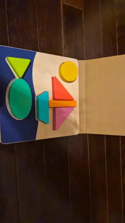 Wooden double sided puzzle from Lovevery's Helper Play kit. In original packaging.