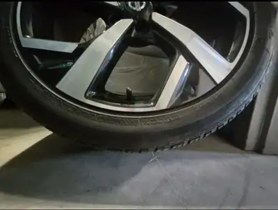 Brand new tires and really nice factory Nissan rims from a Nissan 225/45/19 Bridgestone