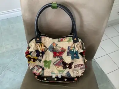 Marino Orlando handbag value of $1,150, View more