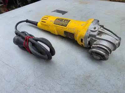 For sale a DEWALT 7 amp 4 1/2-inch Small Angle Grinder Without The Guard. Model # DWE4011 Store SKU...