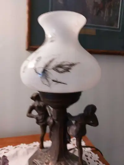 quaint small antique lamp, View more