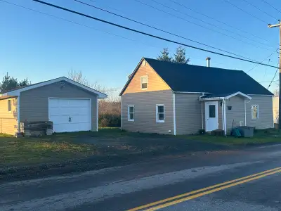 Why buy a fixer home or a mini home when you can buy a 4 bedroom house + garage on a 1/4 acre of lan...