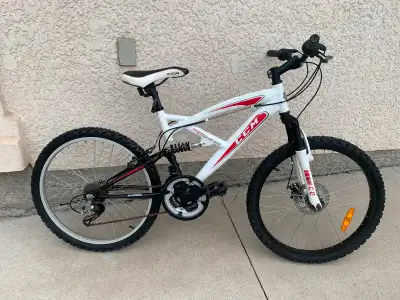 CCM mountain bike, 24” wheels. Dual suspension, disc brake, quick release seat post, shimano hardwar...