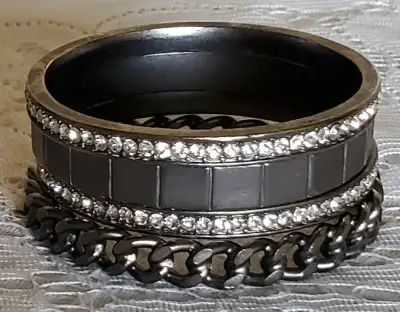 4 ORNATE METAL BANGLES, View more