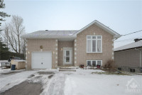 Purpose Built Bungalow with 2 units on corner lot in Rockland!