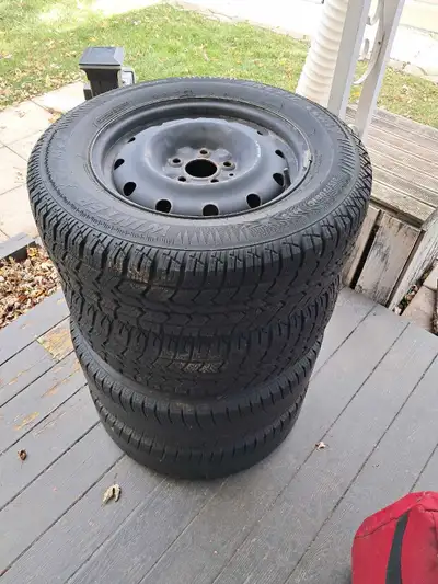 4 winter tires on rims. 1 tire and rim are 2 seasons old, 1 tire is 3 seasons old and 2 tires are un...