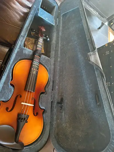 Beginner violin in good condition. Comes with one extra string, chinrest, and rosin. No bow . After...