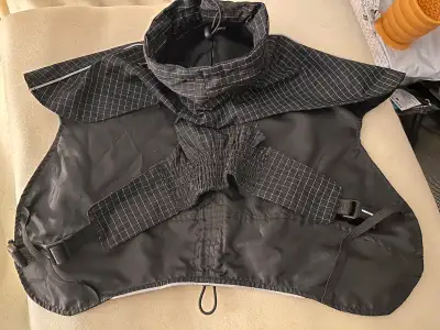 Canada Pooch Raincoat. Size 14. Used twice. Pick up only. No holds. $50. Price is not negotiable. Ca...