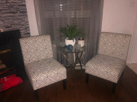 Beautiful accent chairs in good condition and glass table