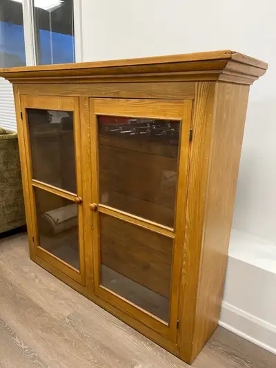 This beautiful solid wood piece was the top of a hutch. It is an antique and could be made into a gr...