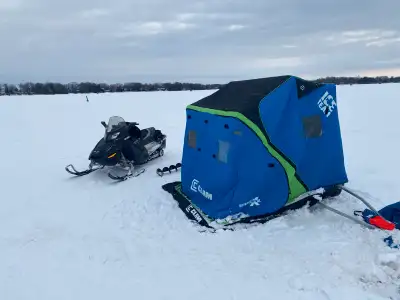 Skidoo, trailer and ice fishing hut. 21,000 kms 2009