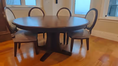 fine round dinning table and 6 chairs, solid wood and hand made. Just table is $2500, $400/chairs, t...