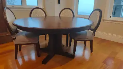 fine round dinning table and 6 chairs, solid wood and hand made. Just table is $2500, $400/chairs, t...