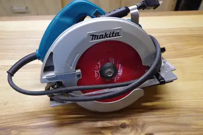Makita circular saw Model 5007F. Corded. Accepts 7-¼” blades. 15A motor. Has a fence and wrench. Wit...