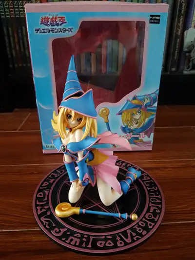 Figure of Dark Magician Girl from Yugioh by Kotobukiya. She still has her box. She has a few scuffs...