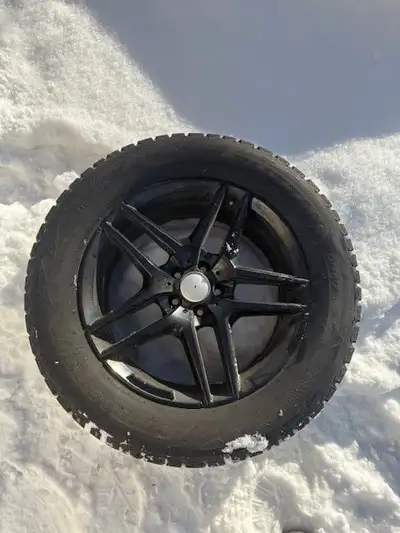 Bridgestone Blizzak Winter Tires 275/55 R19 111T with Aluminum Rims. Made in Japan. Used 2 seasons o...