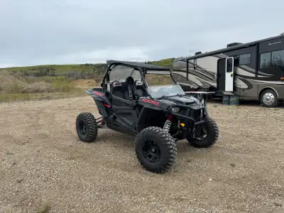 Looking to trade our 2014 Polaris rzr xp 1000 for a boat. Can add cash for the right one Unit has 49...