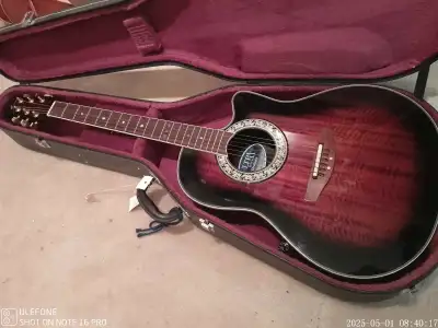 I'm offering an new new Ovation Ultra Deluxe guitar, a beautiful no chips no scrach instrument with...
