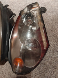 2003-2005 Infiniti G35 Headlamps used