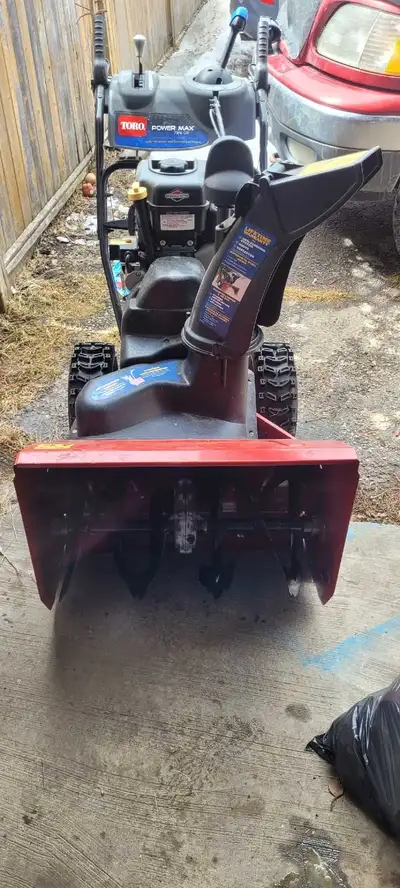 Toro snowblower like new, electric start, anticlog system for heavy snow, used very little has maybe...