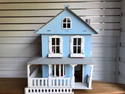 1970’s wood doll house with kid friendly furniture