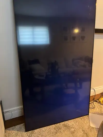 Selling a 65” Samsung TV that requires repair. The TV powers on, but the display has issues as shown...
