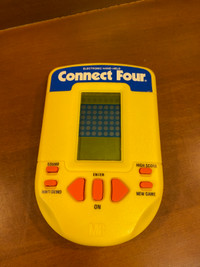 Vintage 1995 Milton Bradley Electronics Handheld Game Connect 4.