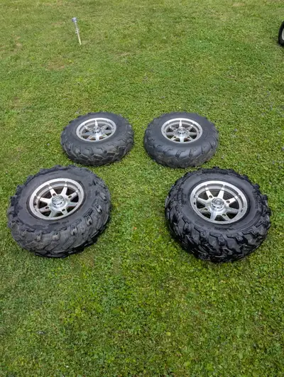 350$ for 4 aluminum rims that fit Polaris Sportsman 500