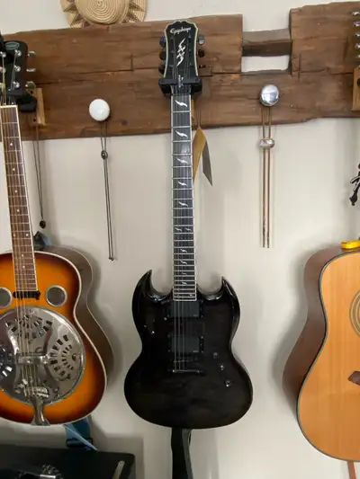 Smokey grey mottled finish. Crazy fast neck and sooth pots. Due to finances, have to sell this and o...