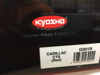 Kyosho 1/18 Cadillac CTS sedan in red