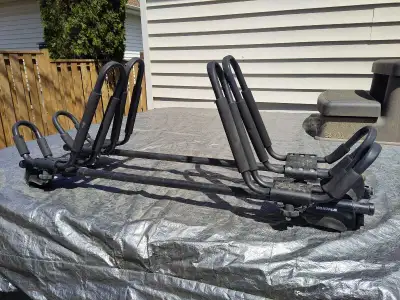 2 sets of Kakak or SUP racks. Mounted on Yakima rail grab with 48" bars. Can easily be removed to mo...