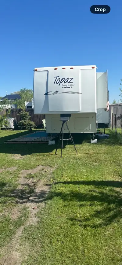Triple E 32’ fifth wheel two slides. On seasonal site fees paid until June 2027. Lots of extra campi...