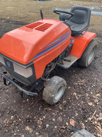 Husqvarna tractor with snowblower and mower deck attachments