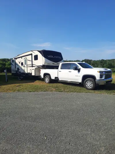 Two bath, bunk model 2019 Volante 270BH, Still smells like new. Modern style, high ceilings, double...