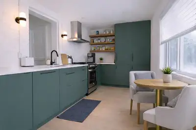 This fully renovated one-bedroom sits above a unique laundromat/art gallery in the heart of Roncesva...