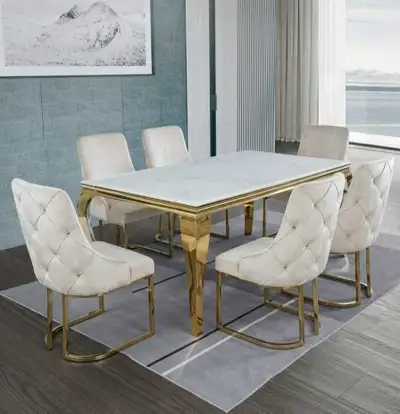 White Marble Dining Table with Gold Legs and Cream Tufted Chairs, View more