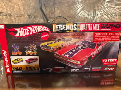Features: Official Hot Wheels Legends of the Quarter Mile Series Snake vs. Mongoose drag racing them...