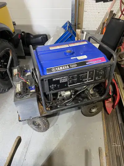 Propane generator engine hours unknown comes with 2 batteries and 100 pound propane tank, may have 2...